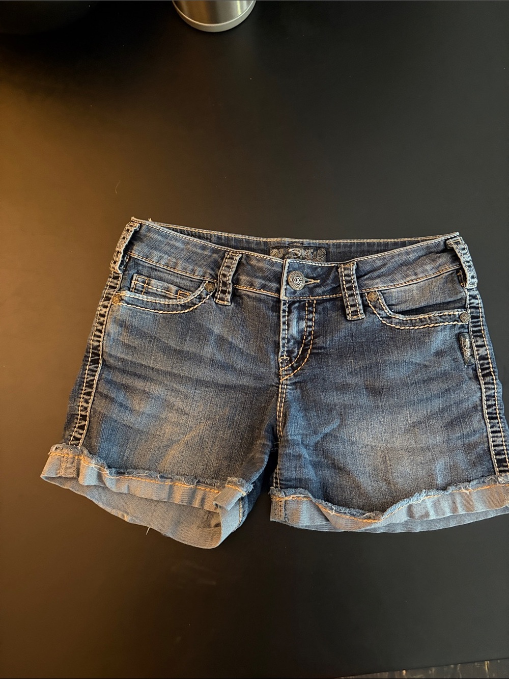 Silver Jeans Women's Rolled Hem Denim Shorts in Dark Blue Wash